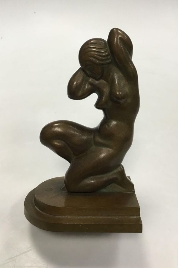 Tinos Bronze figure / Book support of kneeling woman