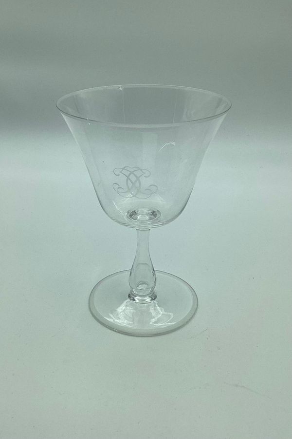 Wine glass with monogram on bell-shaped bowl and hollow stem c. 1930-1950