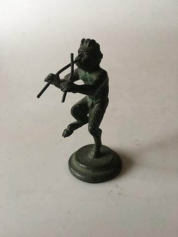 Antique Bronce Figurine of a Pan playing flutes