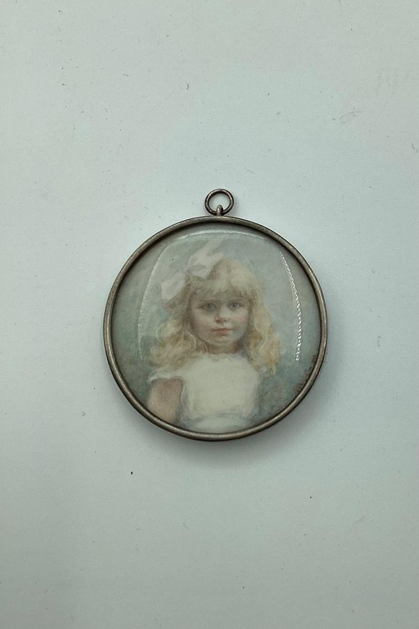 Watercolour miniature portrait of blonde girl with bow in her hair from ca. 1900