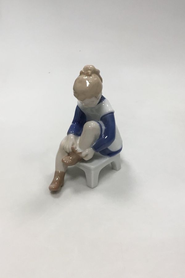 Bing and Grondahl Figurine of girl tying her shoe Marianne No 2373