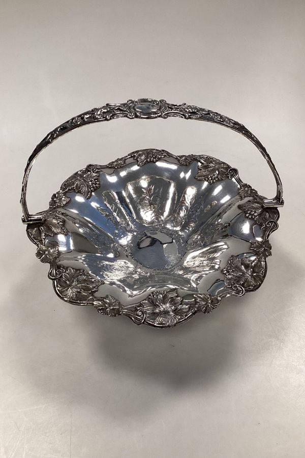 Beautiful European silver-plated basket with handle with floral motif