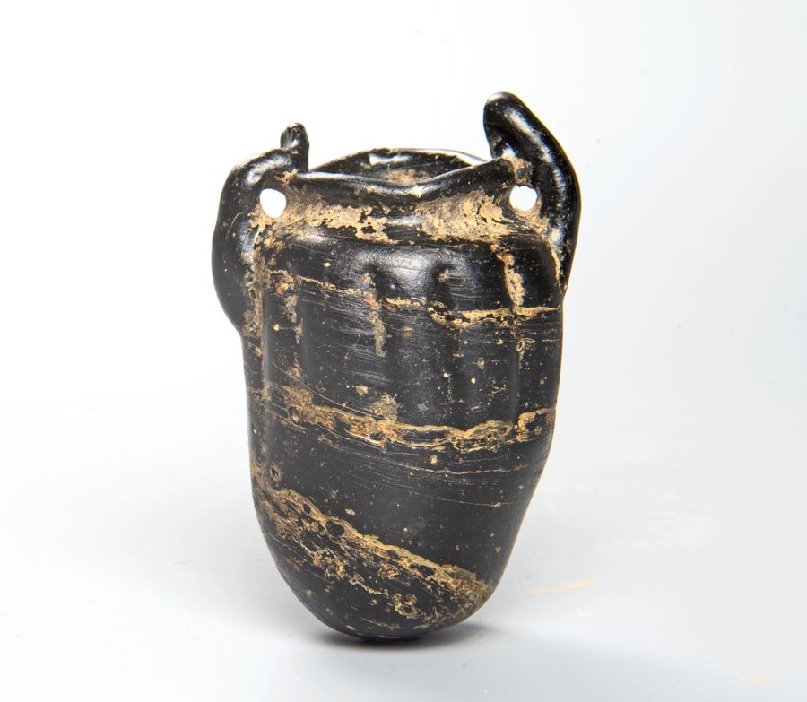 Very rare Roman rod-formed glass vessel