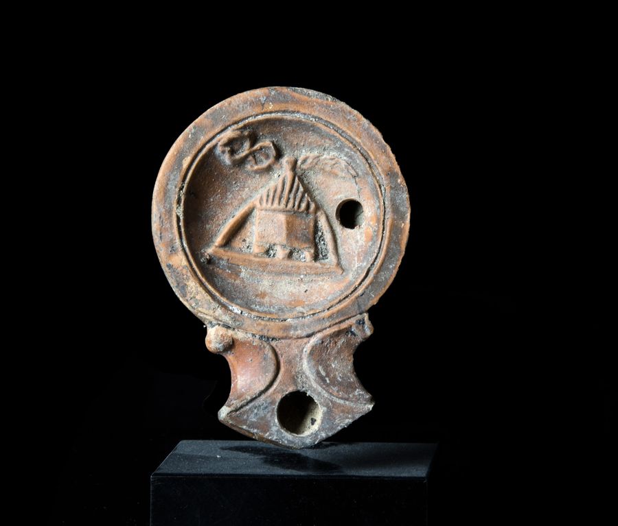 Roman oil lamp with Cista (flaming altar)