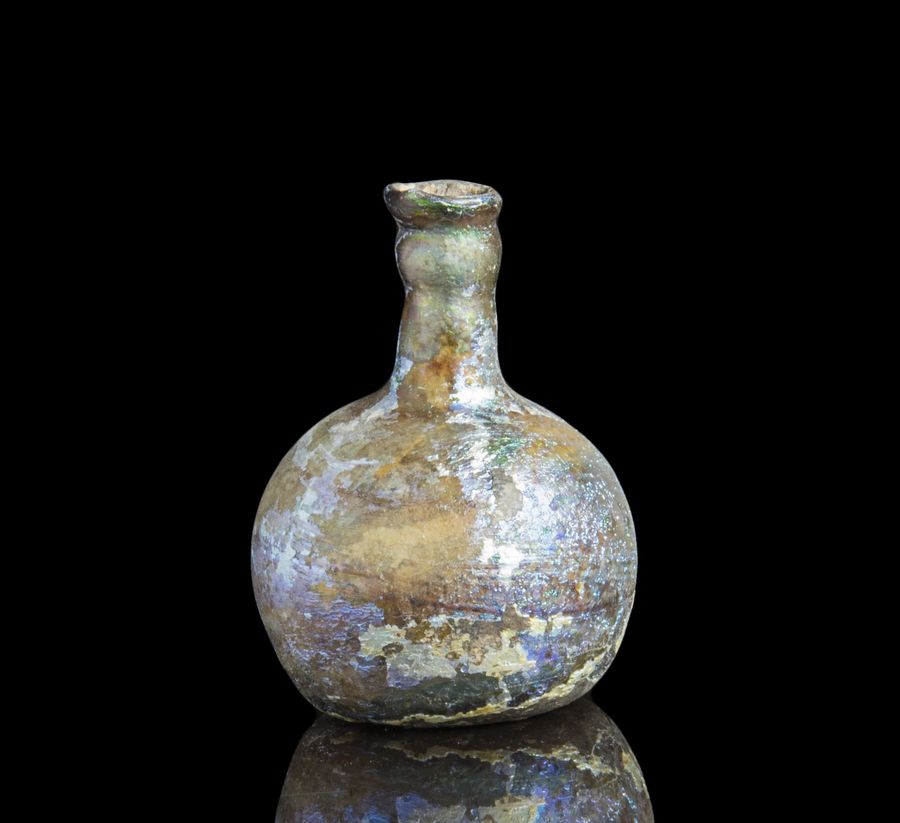 Antique Ancient Roman glass cosmetics flask with pretty iridescence