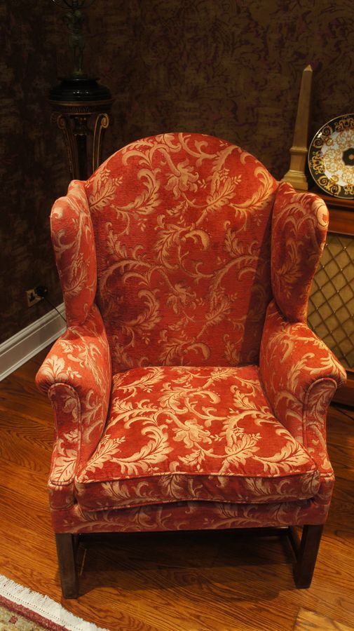 A Pair of George III, Upholstered Wing Chairs c1780 - One with Castors, one without.