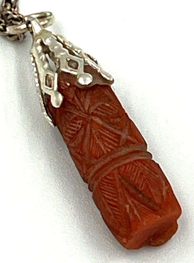 Antique Antique Hand Carved Coral Pendant Set in Silver on Hallmarked Silver Chain