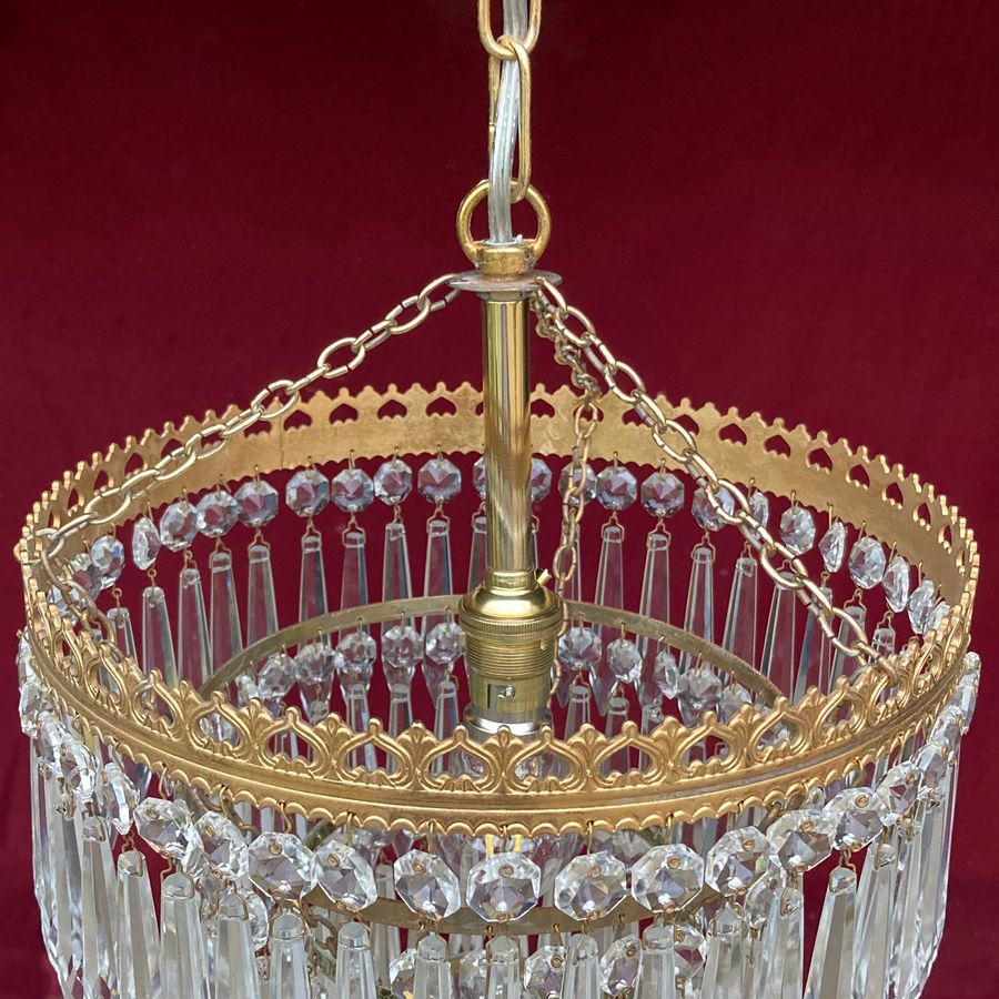 Antique Edwardian four-tier waterfall chandelier.