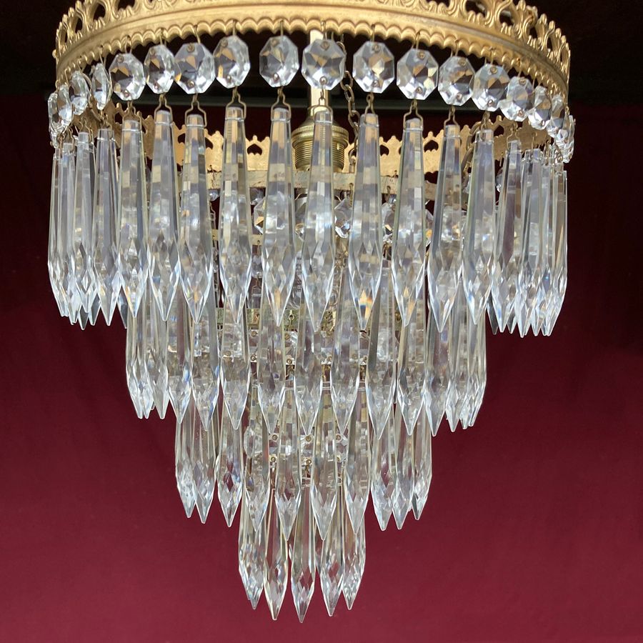 Antique Edwardian four-tier waterfall chandelier.