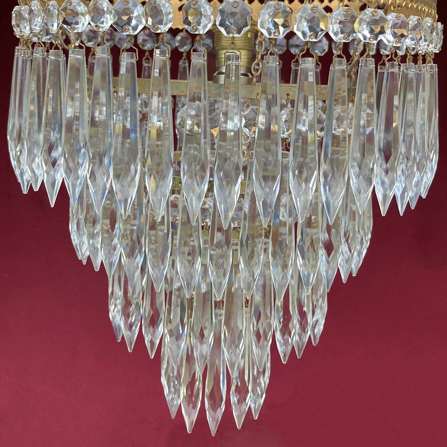 Antique Edwardian four-tier waterfall chandelier.