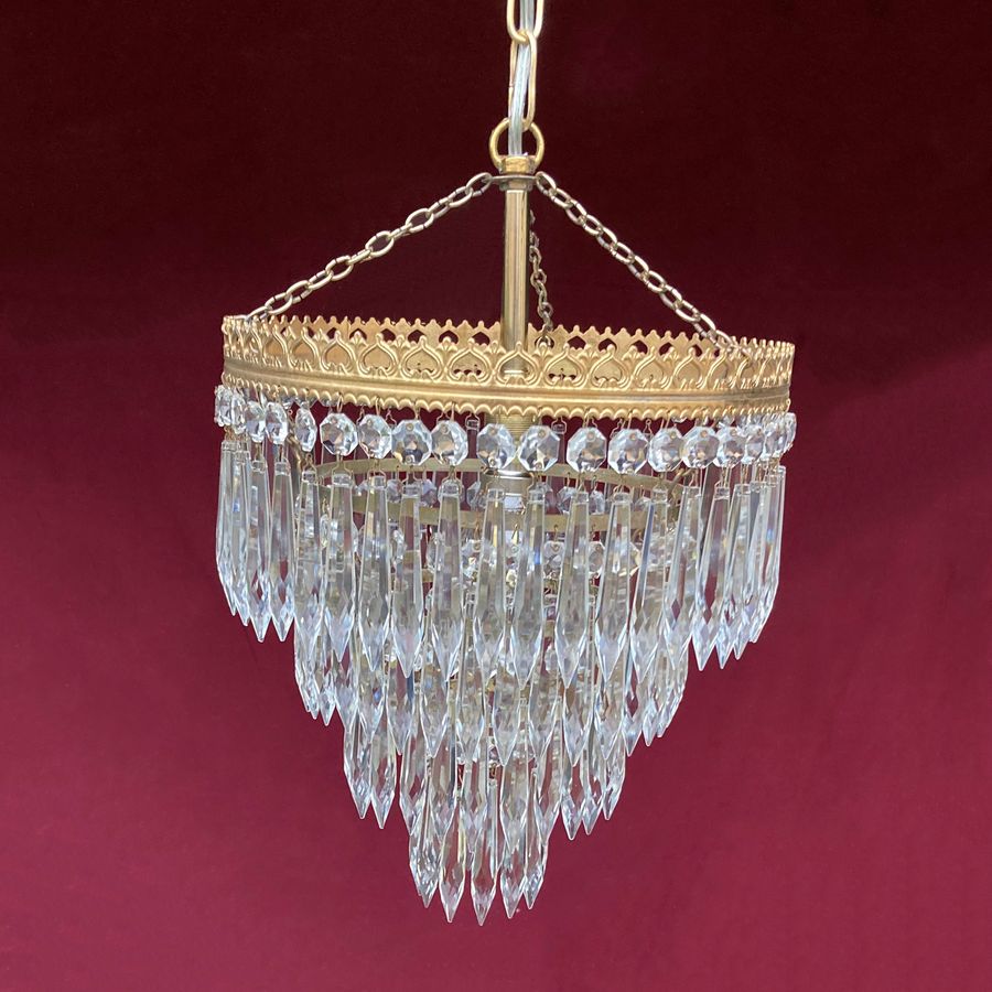 Edwardian four-tier waterfall chandelier.