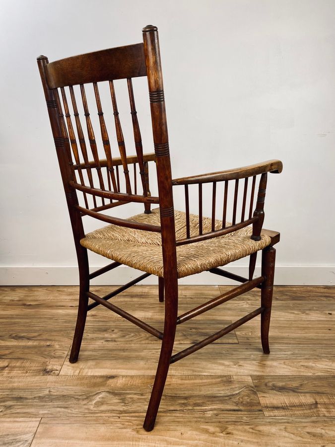 Antique Liberty and Co attributed, in the style of a Morris and Co Sussex armc