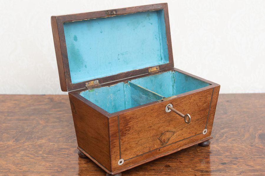 Antique Victorian rosewood and pewter tea caddy.