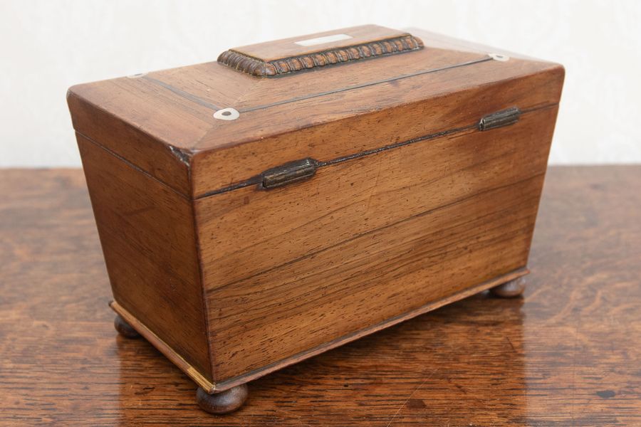 Antique Victorian rosewood and pewter tea caddy.