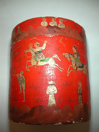 A 19th century paper mache circular hand painted box with oriental players possibly an old tea ca...