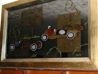 A matched pair of art deco style racing mirrors English 20th century one showing