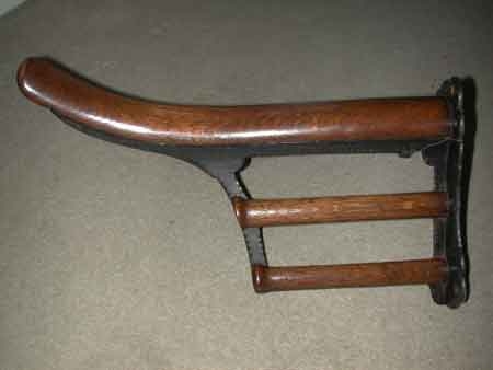 A rare and extremly beautuful patina/wooden and metal late Victorian sadlle rack Maufacturer inscribed on the under neath rubbed Further photographs on request.