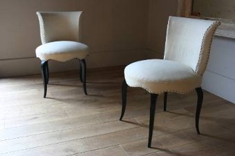 A beautiful pair of occasionalbedroom chairs