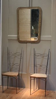 A kitsch 1950s Italian brass mirror