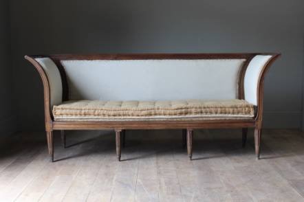 Antique An elegant C18th French oak sofa