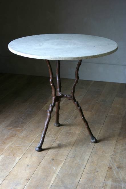 Antique A C19th cast iron twig table with marble top