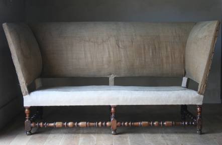Antique A fantastic early wing sofa