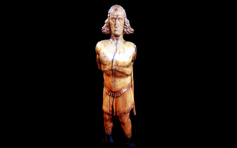 17th century limewood figure on water marble base